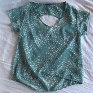 Sheer fish print blouse with peek-a-boo back